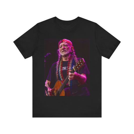 A black graphic t-shirt featuring an outlaw country legend graphic of Willie Nelson.