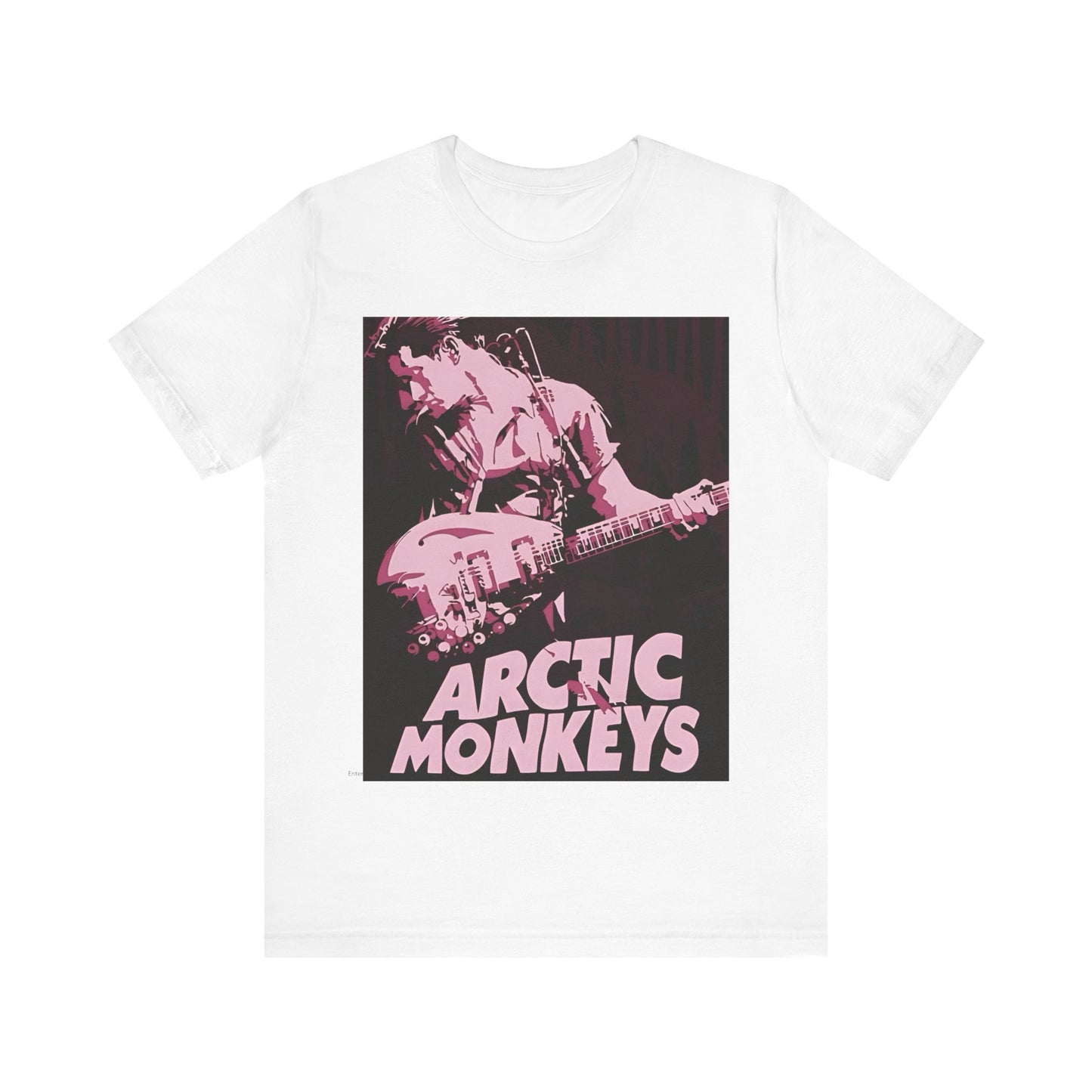 A black graphic t-shirt featuring the Arctic Monkeys logo in a prominent pink color, creating an aesthetic look.