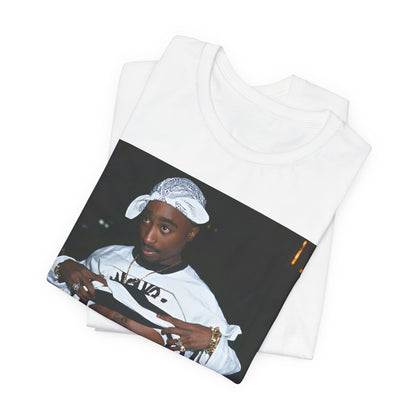 A black graphic t-shirt featuring a graphic of Tupac Shakur (2Pac).