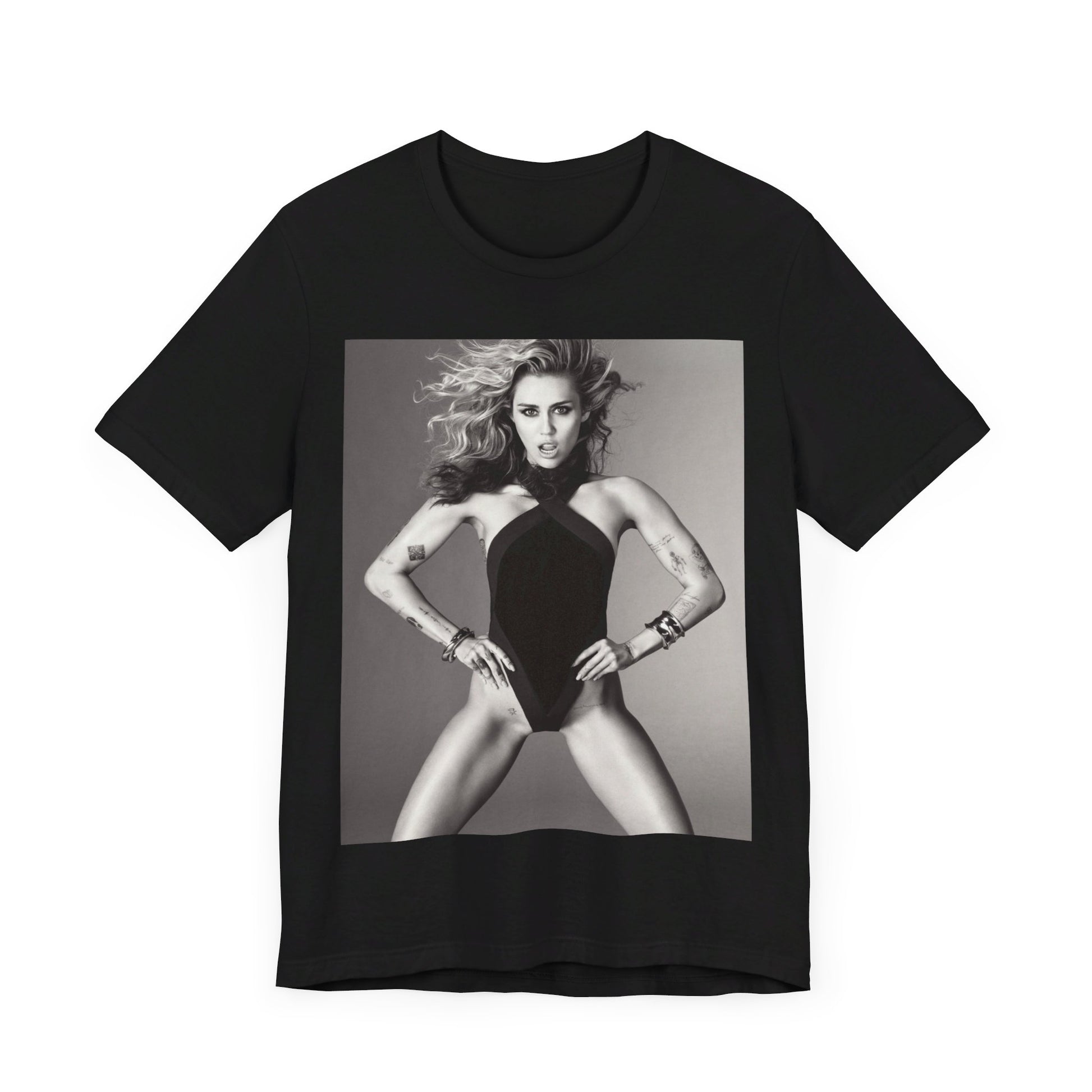 A black graphic t-shirt featuring a bold graphic of Miley Cyrus as a pop superstar.