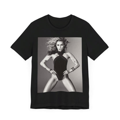 A black graphic t-shirt featuring a bold graphic of Miley Cyrus as a pop superstar.