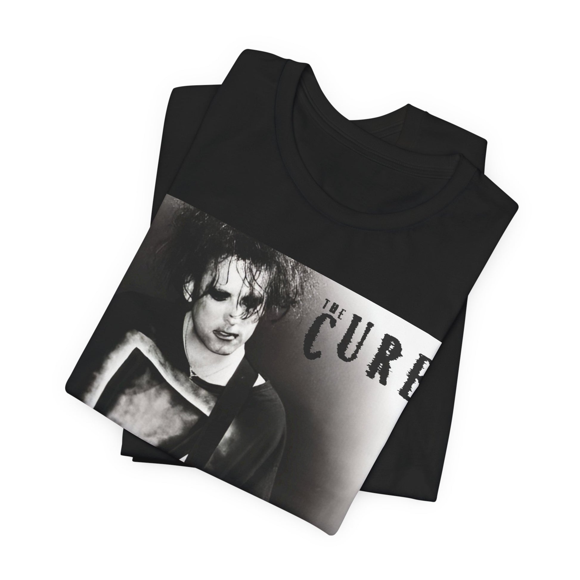 A black graphic t-shirt featuring a vintage goth rock graphic of The Cure.
