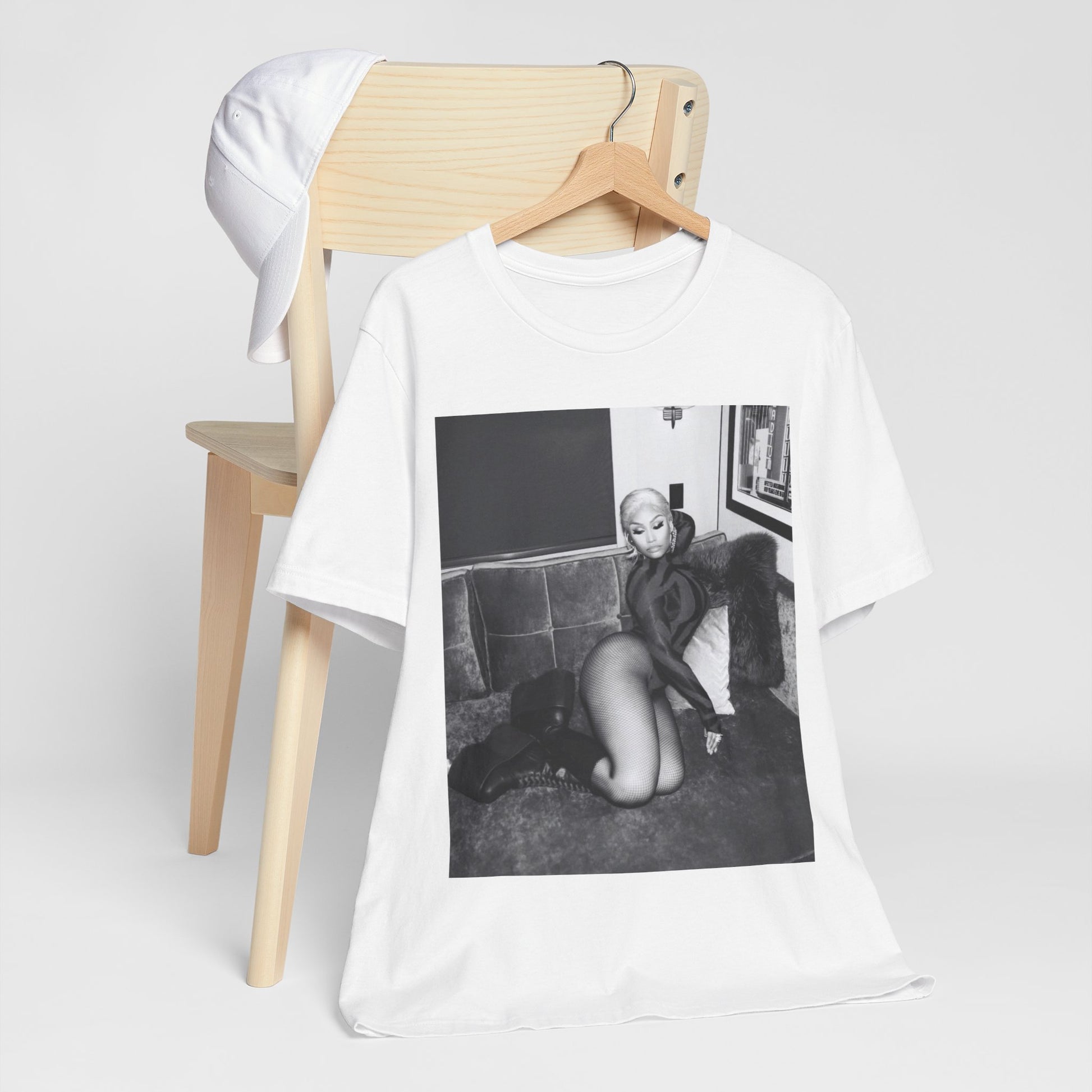 A black graphic t-shirt featuring a fierce black and white glamour graphic of Nicki Minaj.