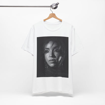 A black graphic t-shirt featuring a black and white portrait photo of Tinashe.