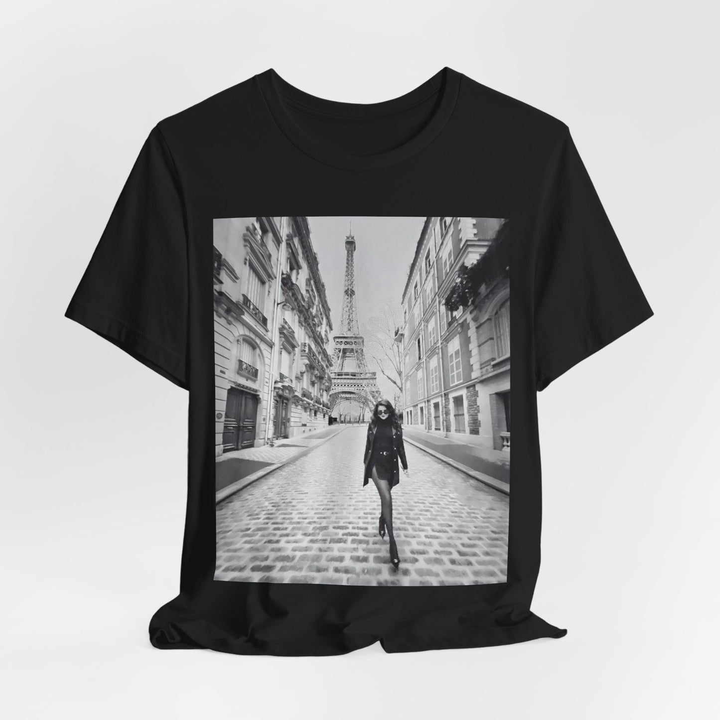 A black graphic t-shirt featuring a black and white photo of Selena Gomez in Paris.