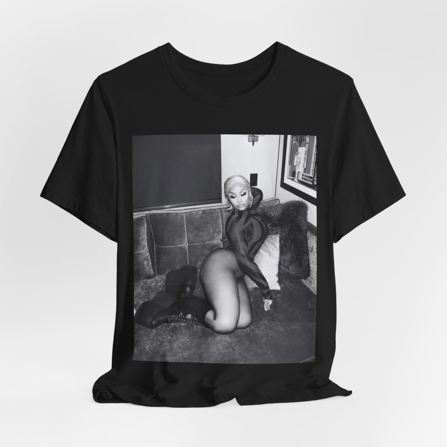 A black graphic t-shirt featuring a fierce black and white glamour graphic of Nicki Minaj.