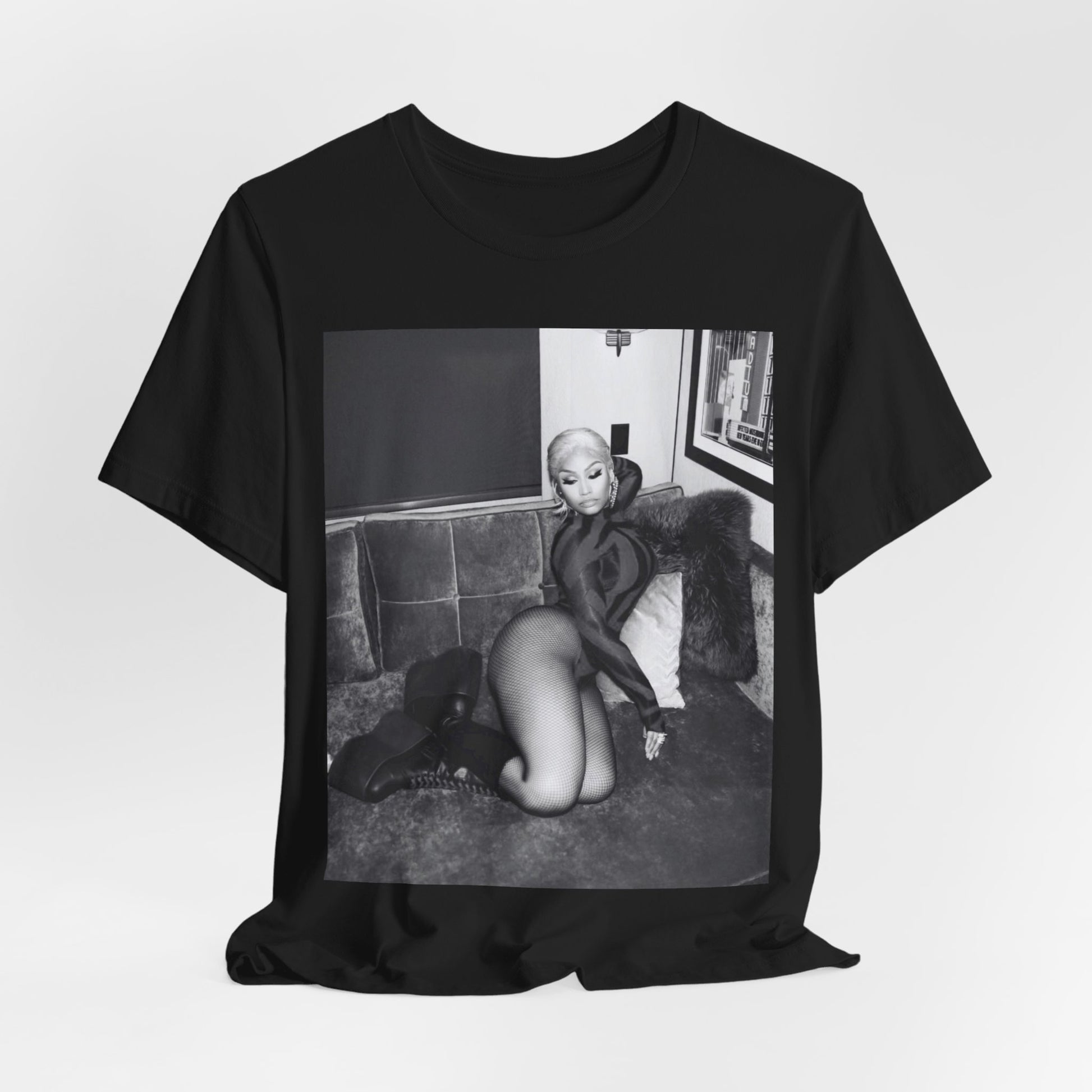 A black graphic t-shirt featuring a fierce black and white glamour graphic of Nicki Minaj.