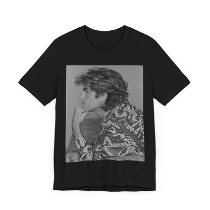 A black graphic t-shirt featuring a graphic of George Michael from his 80s Wham! era.