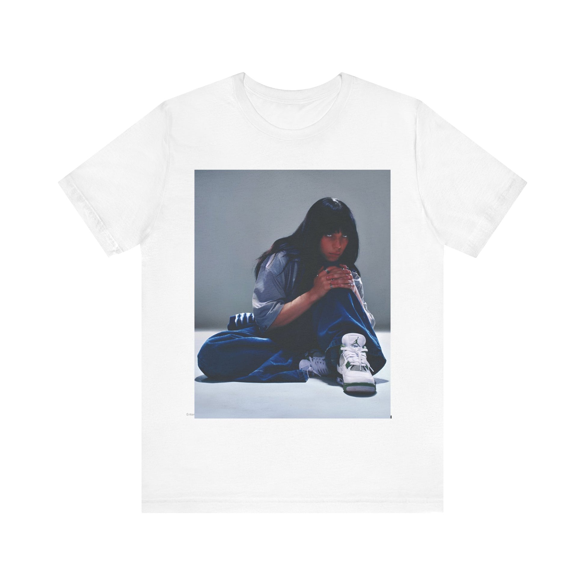 An artistic and slightly melancholic graphic t-shirt inspired by Billie Eilish's song "Lovely," featuring soft colors and a dreamy style.