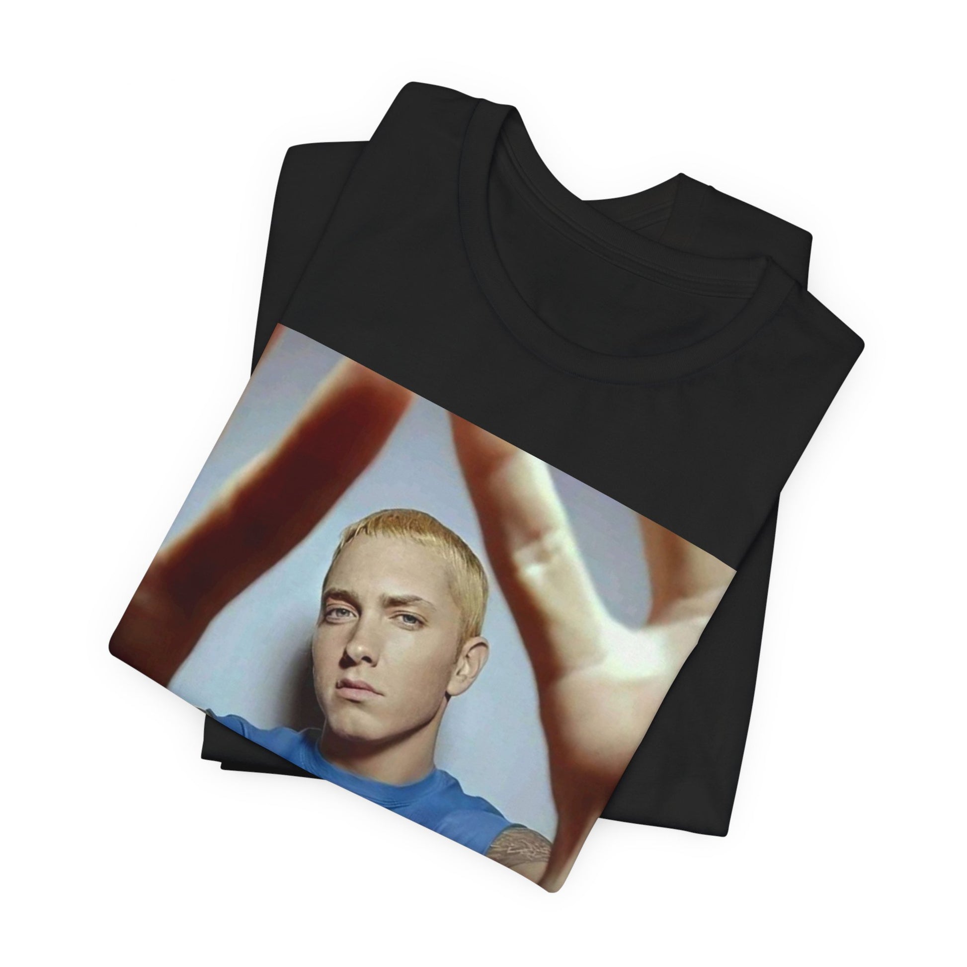 A black graphic t-shirt featuring a graphic related to Eminem's 'The Slim Shady LP' album.