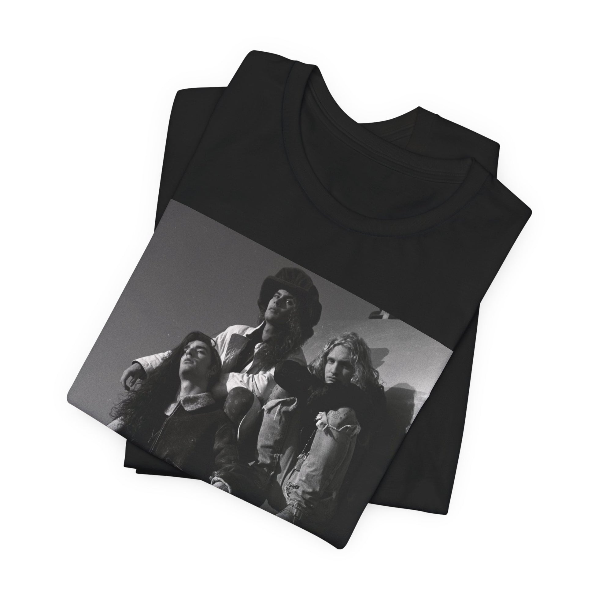 A black graphic t-shirt featuring a 90s black and white photographic portrait of the band Alice In Chains, capturing their iconic grunge look.