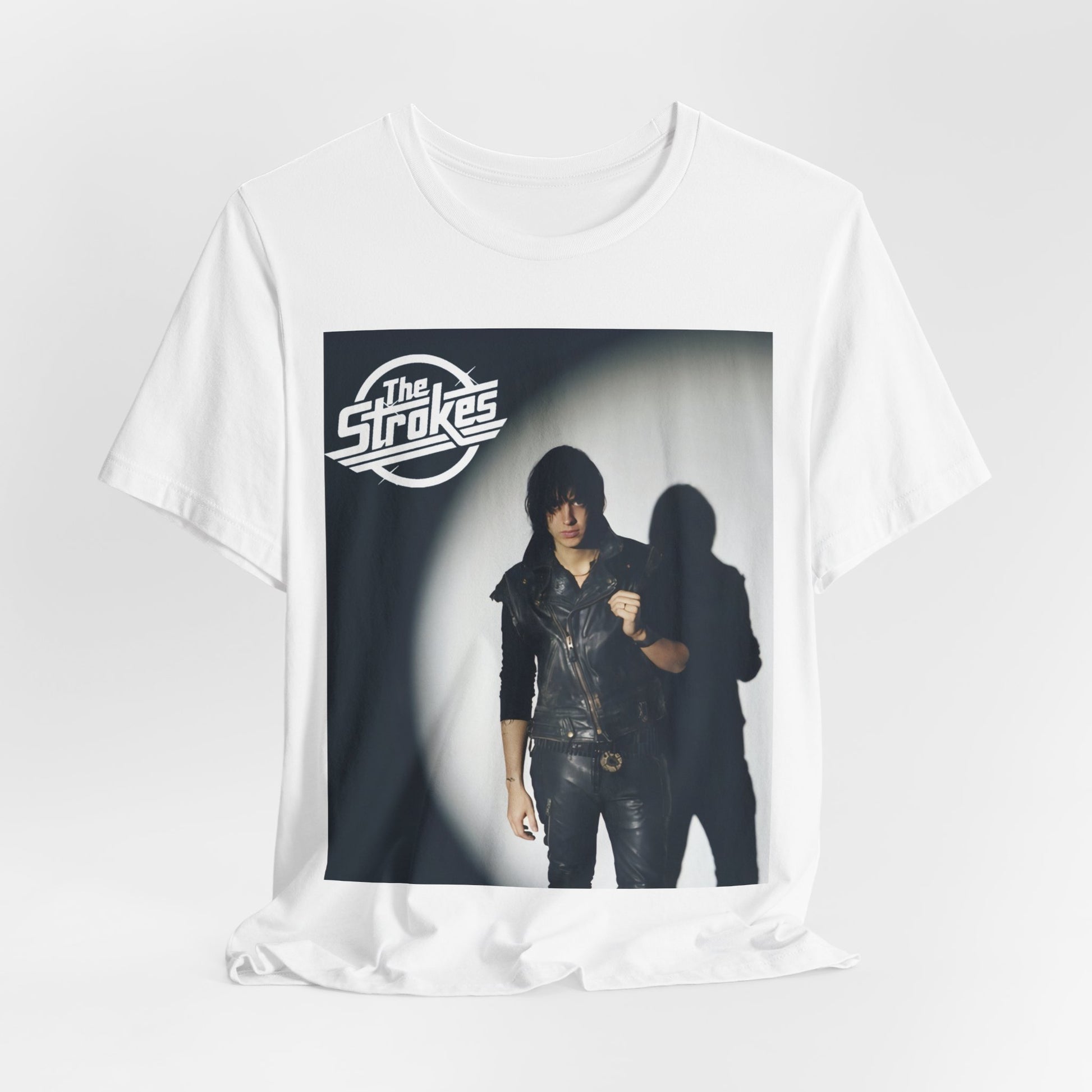A black graphic t-shirt featuring a classic NYC garage rock graphic of The Strokes.