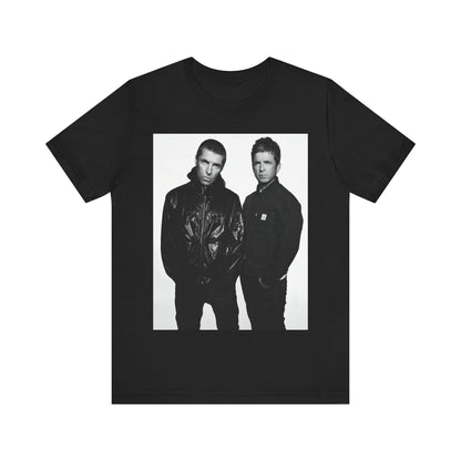 A black graphic t-shirt featuring a graphic of Oasis, possibly suggesting a reunion.