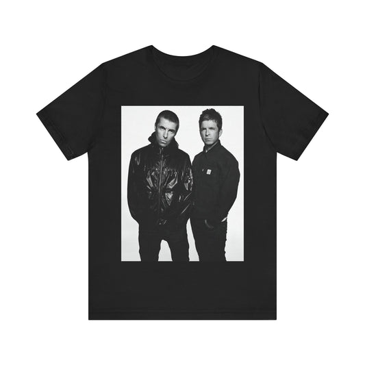 A black graphic t-shirt featuring a graphic of Oasis, possibly suggesting a reunion.