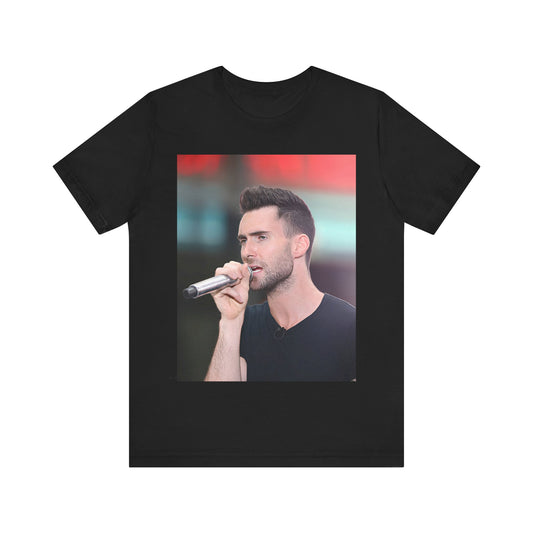 A stylized graphic inspired by the Maroon 5 song "Moves Like Jagger," with funky, retro design elements, on a t-shirt.