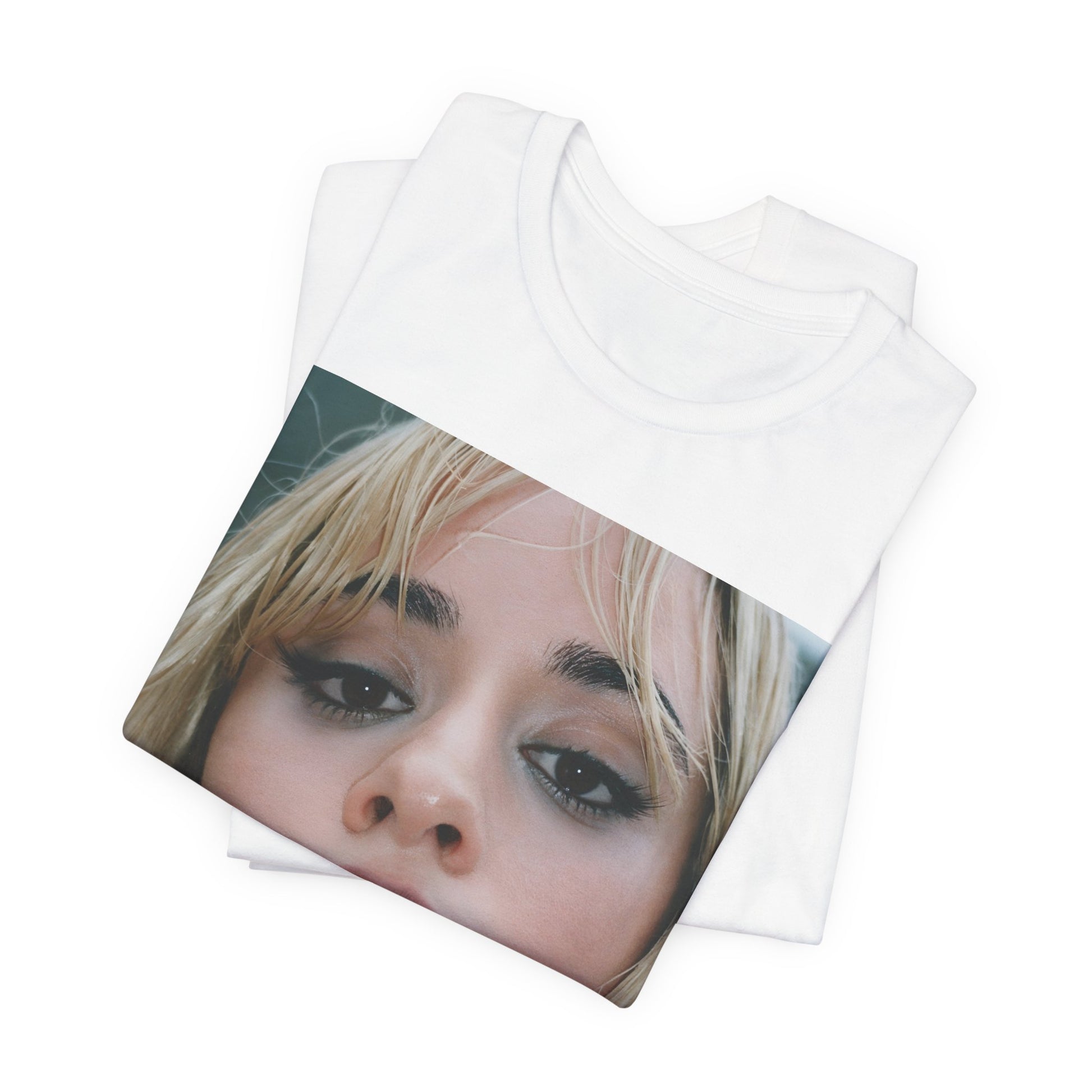 A black graphic t-shirt featuring a graphic related to Camila Cabello's C,XOXO album, with an aesthetic design.