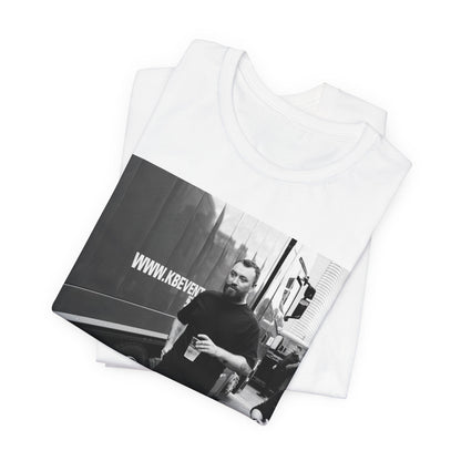 A black graphic t-shirt featuring a graphic or photo of Sam Smith in a backstage setting.
