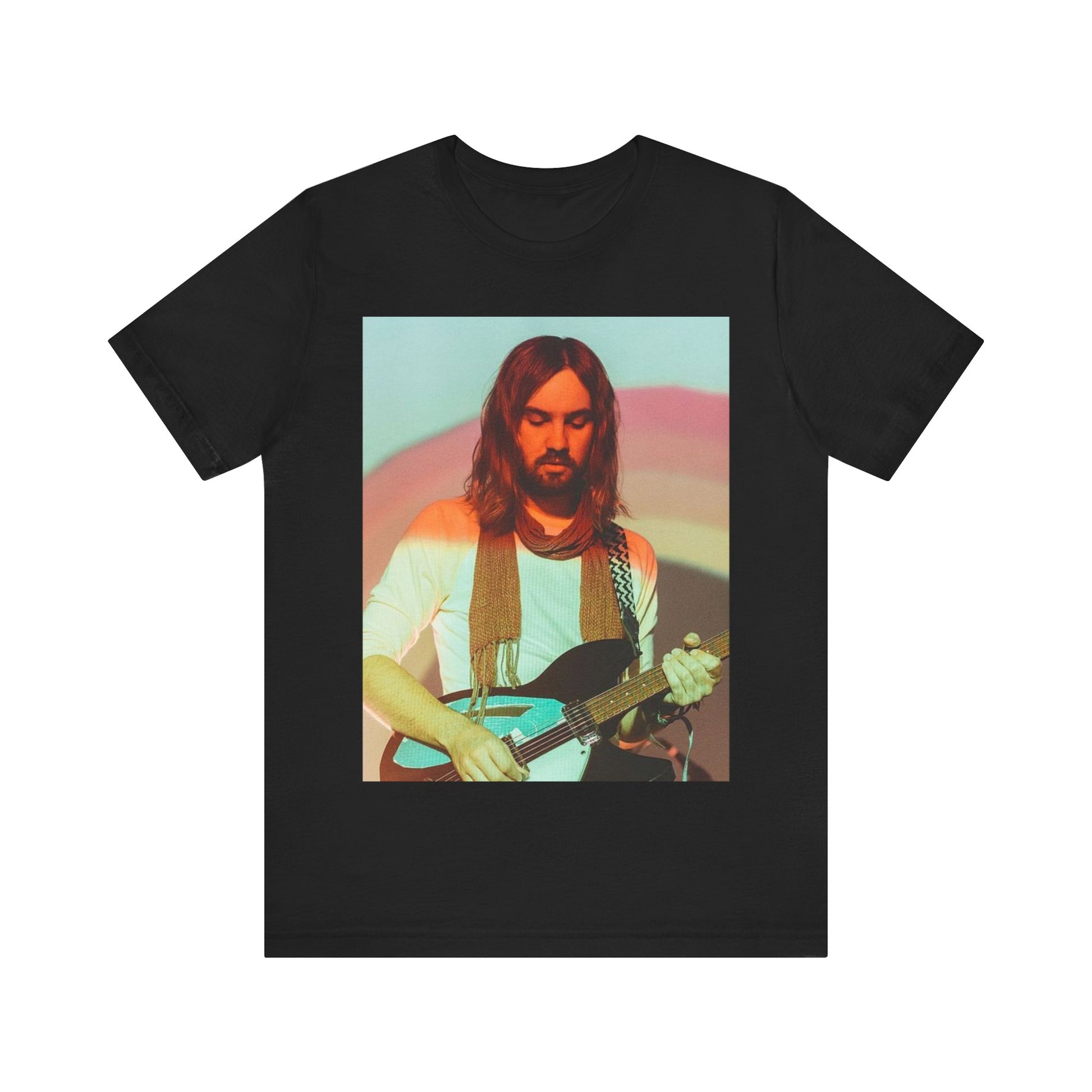 A black graphic t-shirt featuring a dream rock aesthetic graphic of Tame Impala.