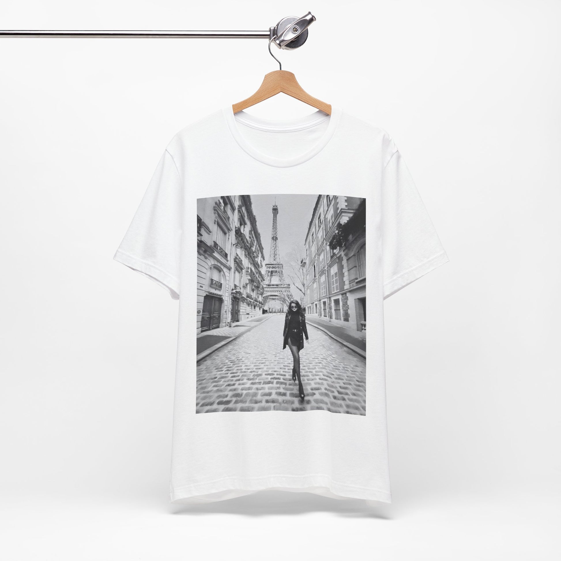 A black graphic t-shirt featuring a black and white photo of Selena Gomez in Paris.