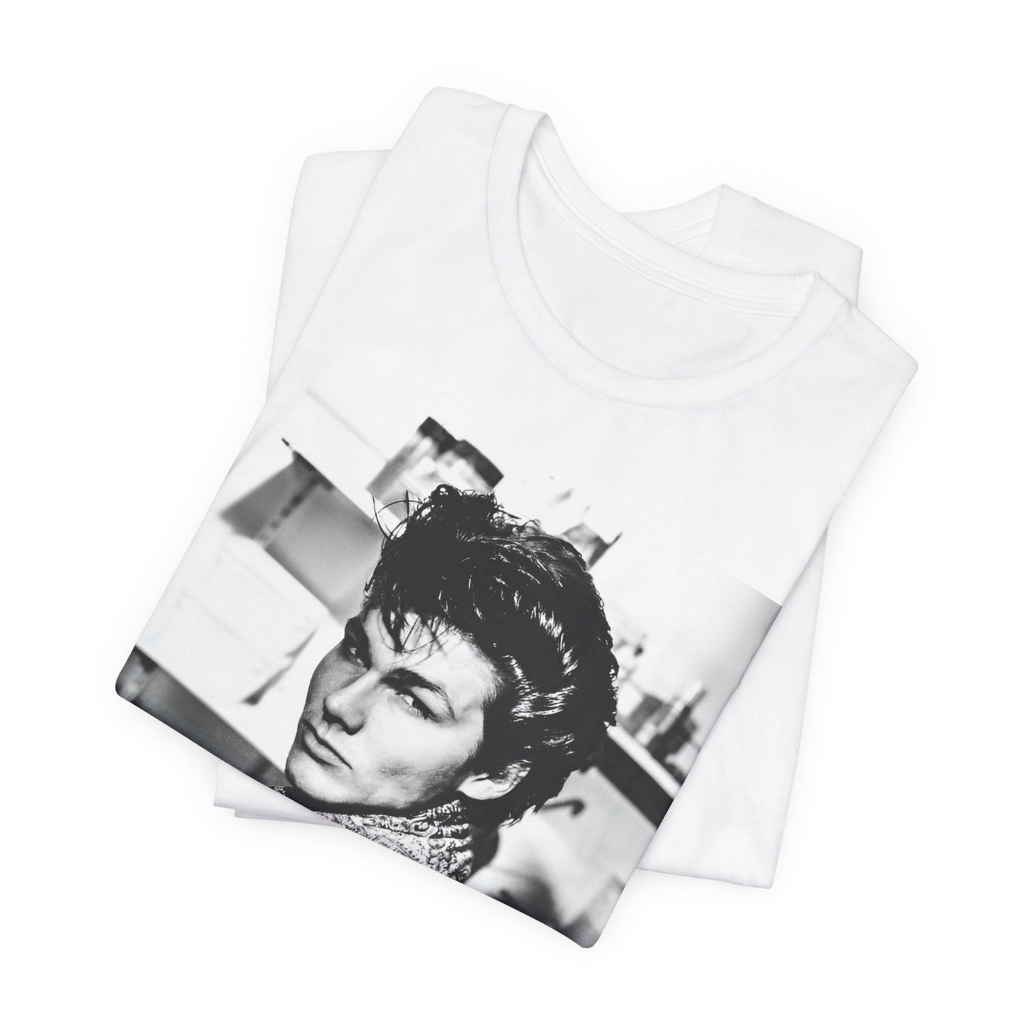 A black graphic t-shirt featuring a retro 1986-style graphic for the band A-HA, possibly with band members in a stylized design.