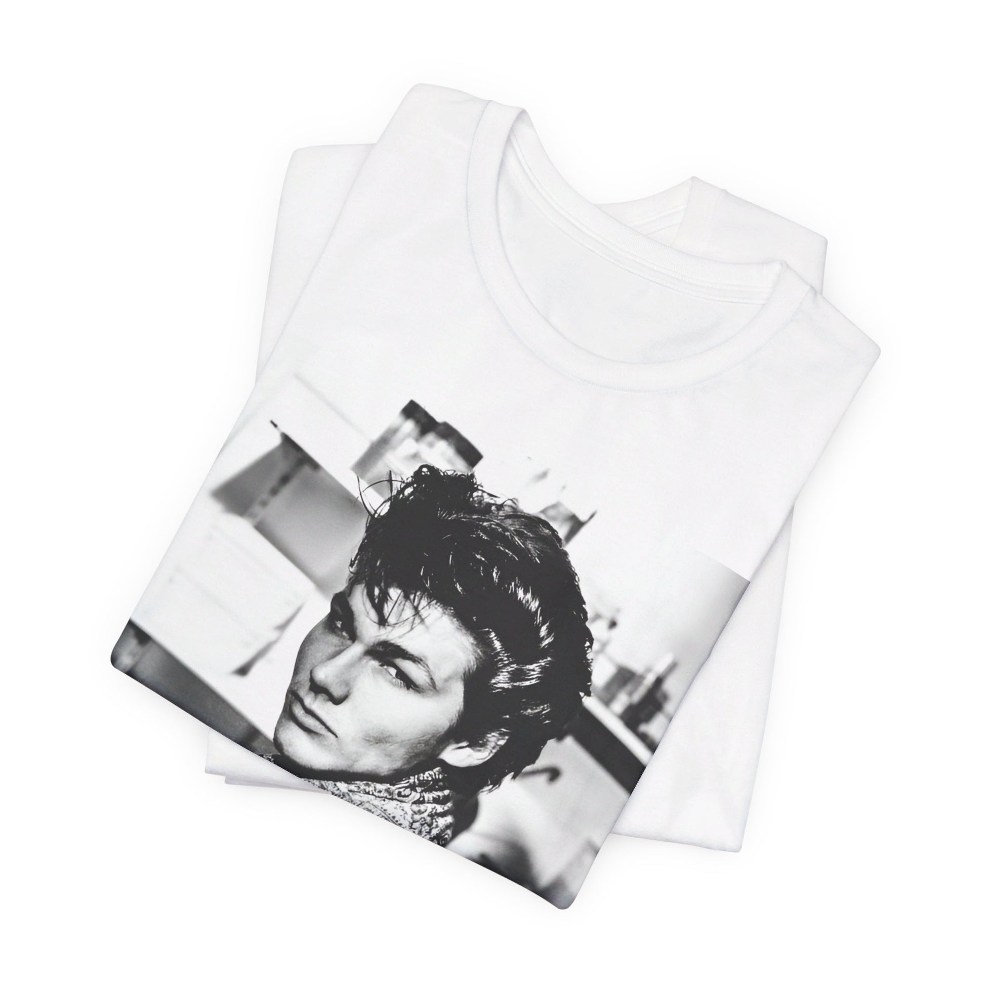 A black graphic t-shirt featuring a retro 1986-style graphic for the band A-HA, possibly with band members in a stylized design.