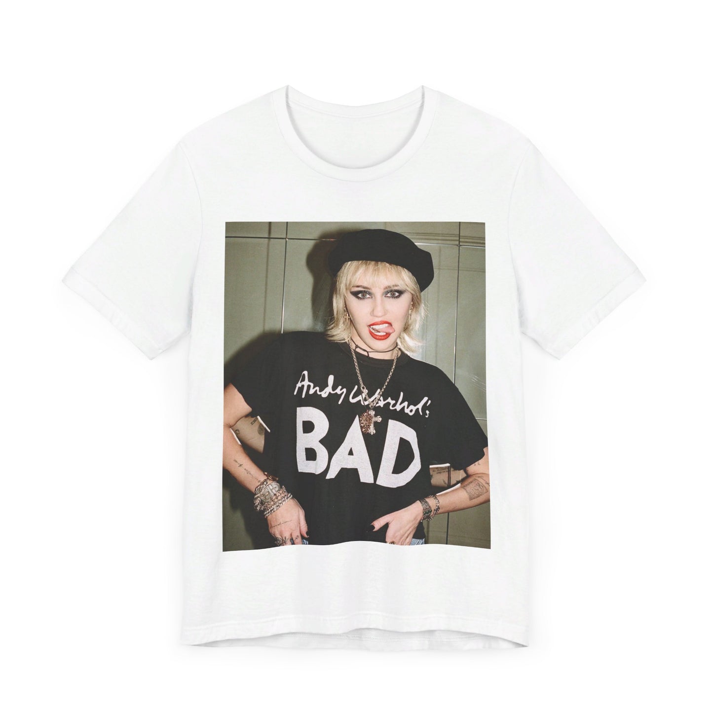 A black graphic t-shirt featuring a graphic related to Miley Cyrus' 'Bad Karma' era.