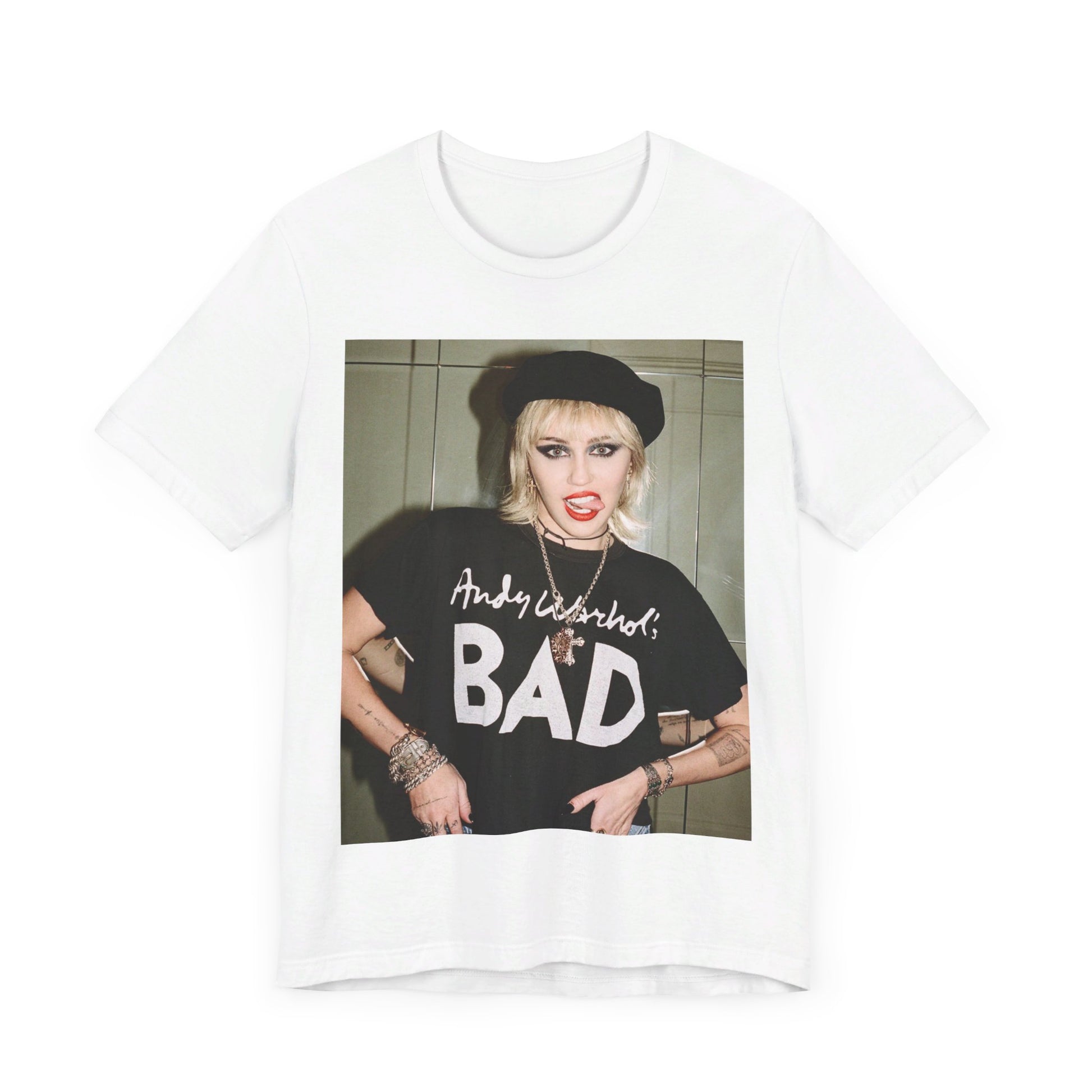 A black graphic t-shirt featuring a graphic related to Miley Cyrus' 'Bad Karma' era.