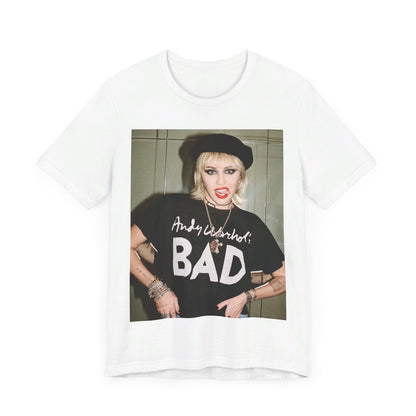 A black graphic t-shirt featuring a graphic related to Miley Cyrus' 'Bad Karma' era.
