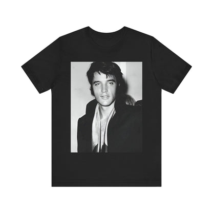 A black graphic t-shirt featuring a black and white rock and roll portrait photo of Elvis Presley.