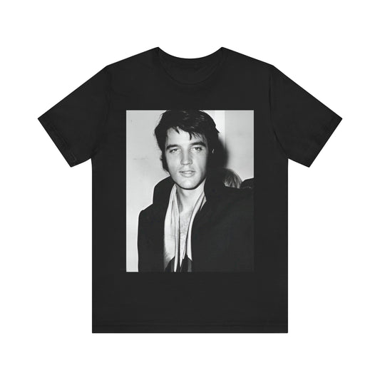 A black graphic t-shirt featuring a black and white rock and roll portrait photo of Elvis Presley.