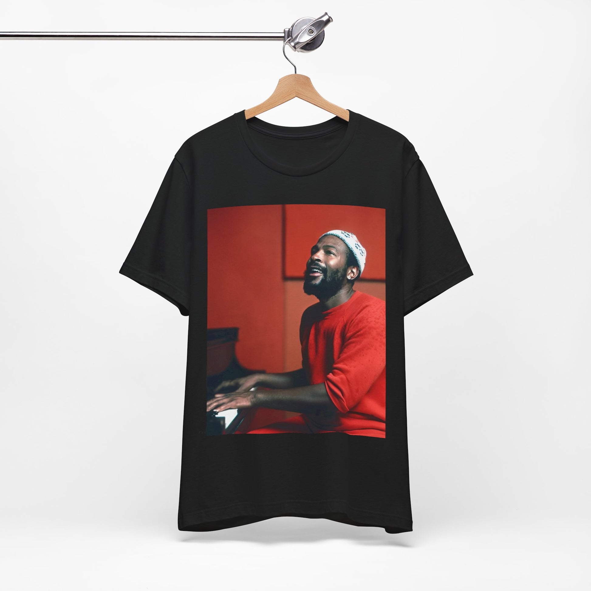 A black graphic t-shirt featuring a graphic of Marvin Gaye with a piano.