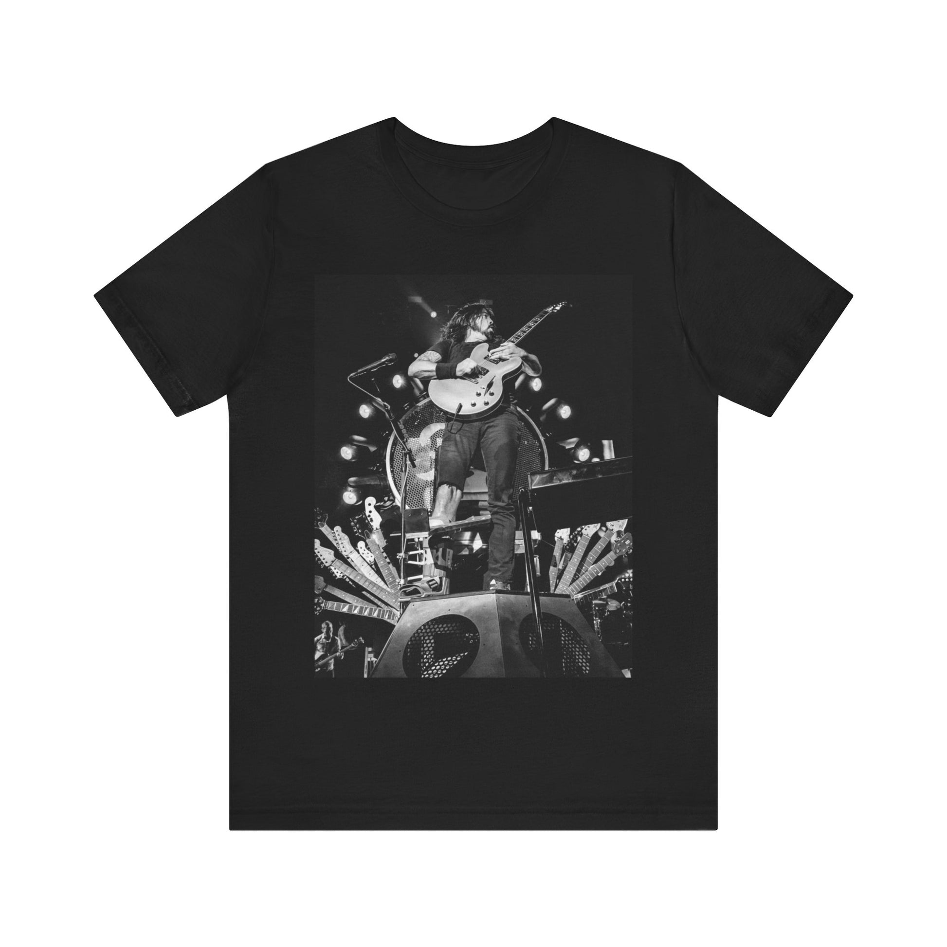 A black graphic t-shirt featuring a vintage photo of Foo Fighters performing live.