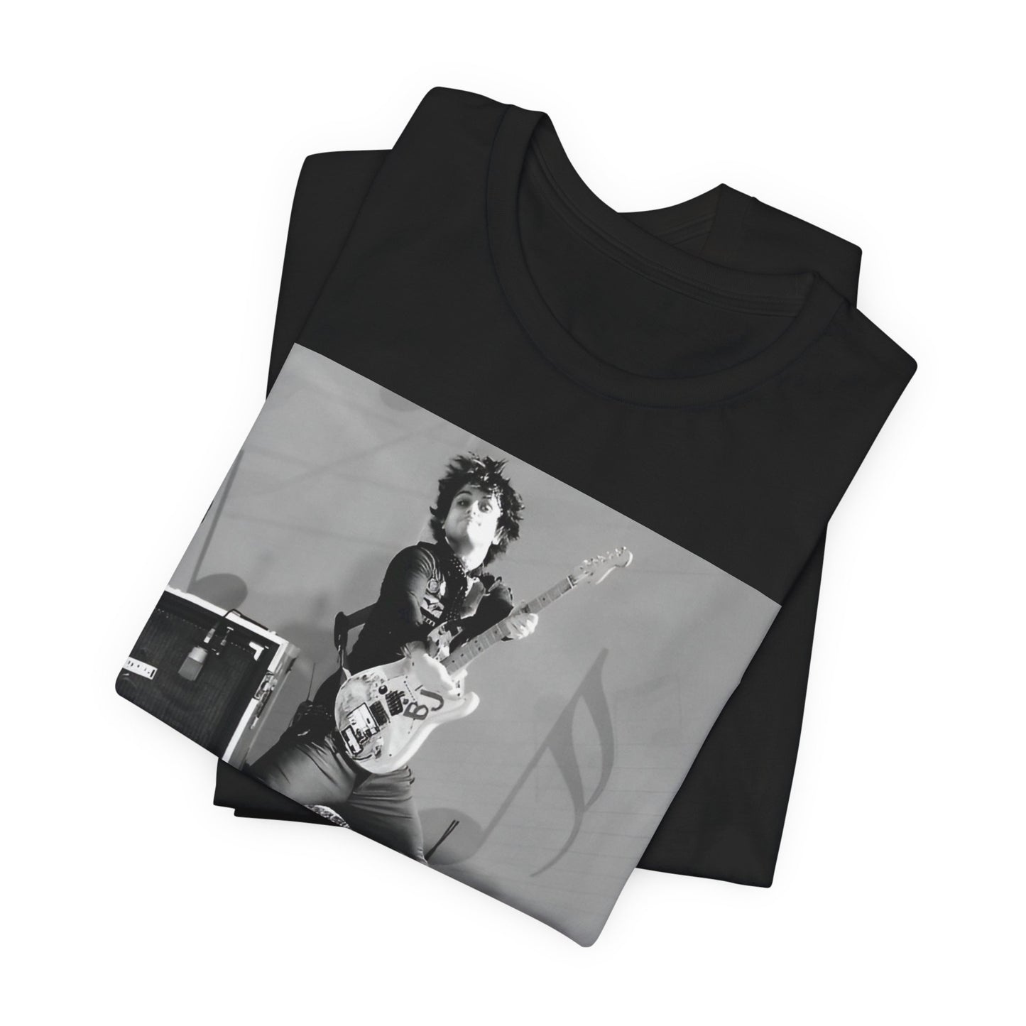 A black graphic t-shirt featuring a graphic of Billie Joe Armstrong from Green Day jumping on stage during a performance.