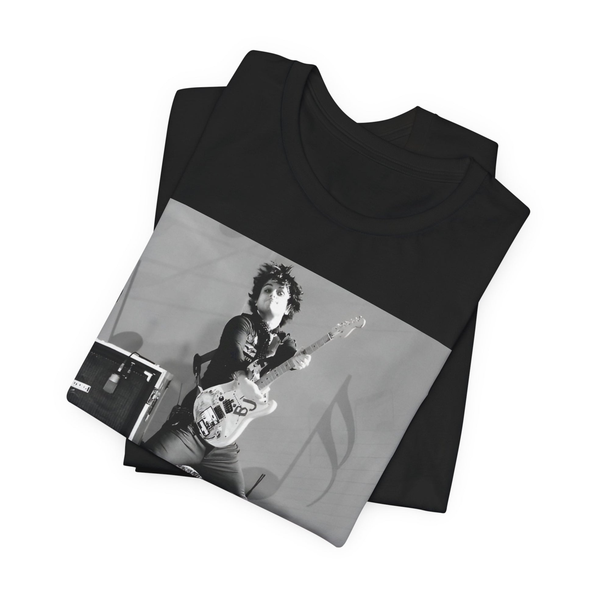 A black graphic t-shirt featuring a graphic of Billie Joe Armstrong from Green Day jumping on stage during a performance.