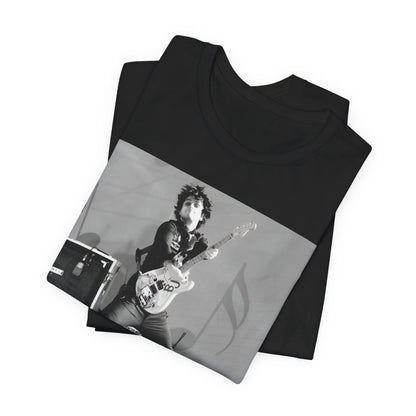 A black graphic t-shirt featuring a graphic of Billie Joe Armstrong from Green Day jumping on stage during a performance.