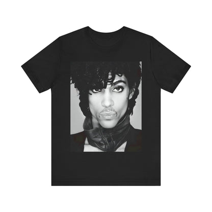 A black graphic t-shirt featuring a black and white photo portrait of Prince.