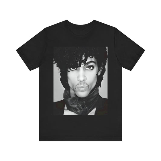 A black graphic t-shirt featuring a black and white photo portrait of Prince.