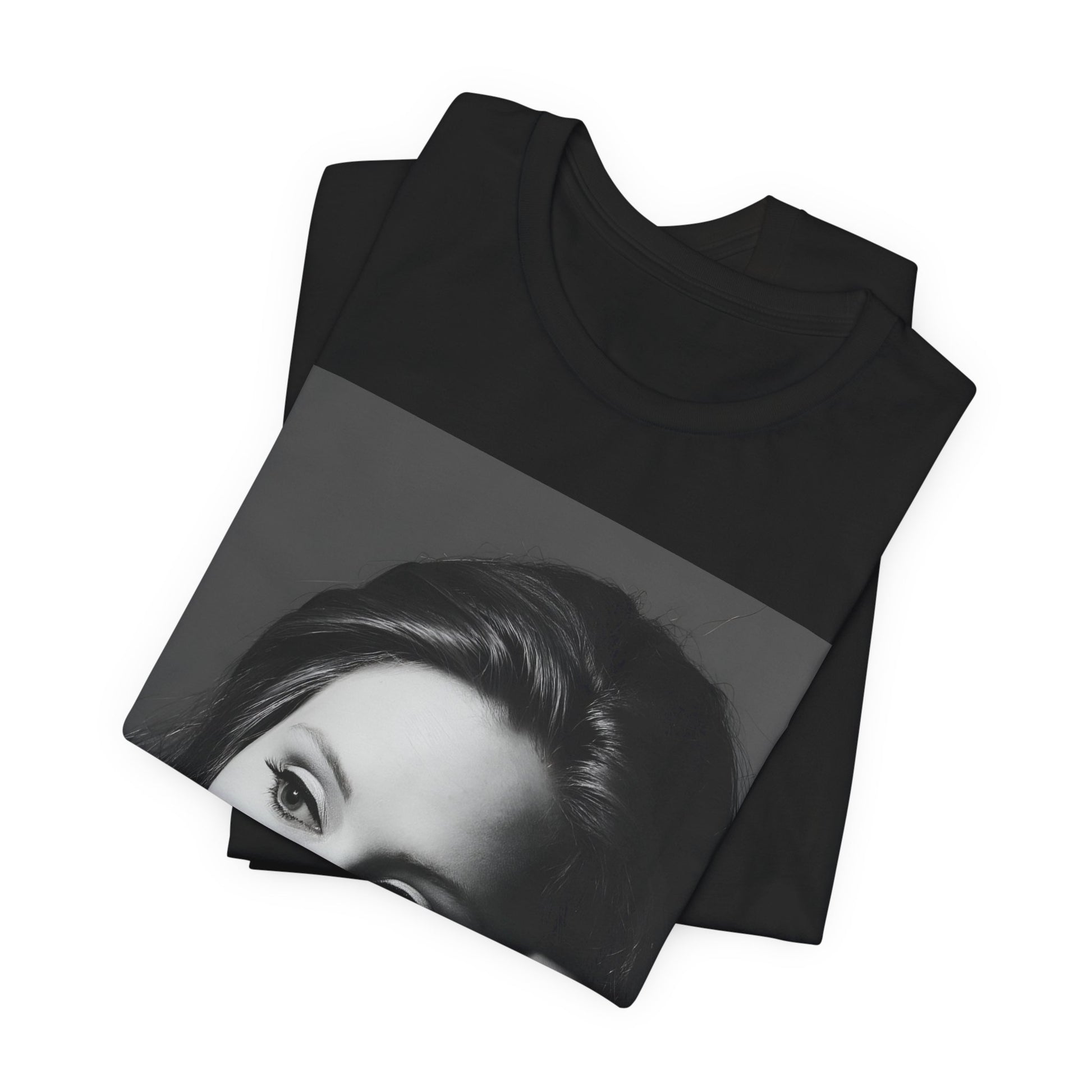 A black graphic t-shirt featuring a vintage-style black and white studio portrait of Adele, showing her with a poised and elegant expression.