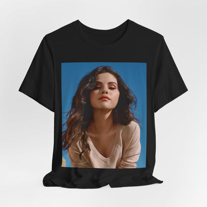 A black graphic t-shirt featuring a vintage pop icon graphic of Selena Gomez.