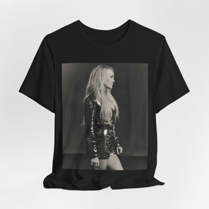 A black graphic t-shirt featuring a black and white photo of Carrie Underwood performing live on stage.