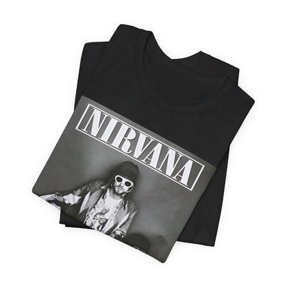 A black graphic t-shirt featuring a 90s rock rebels graphic of Nirvana.
