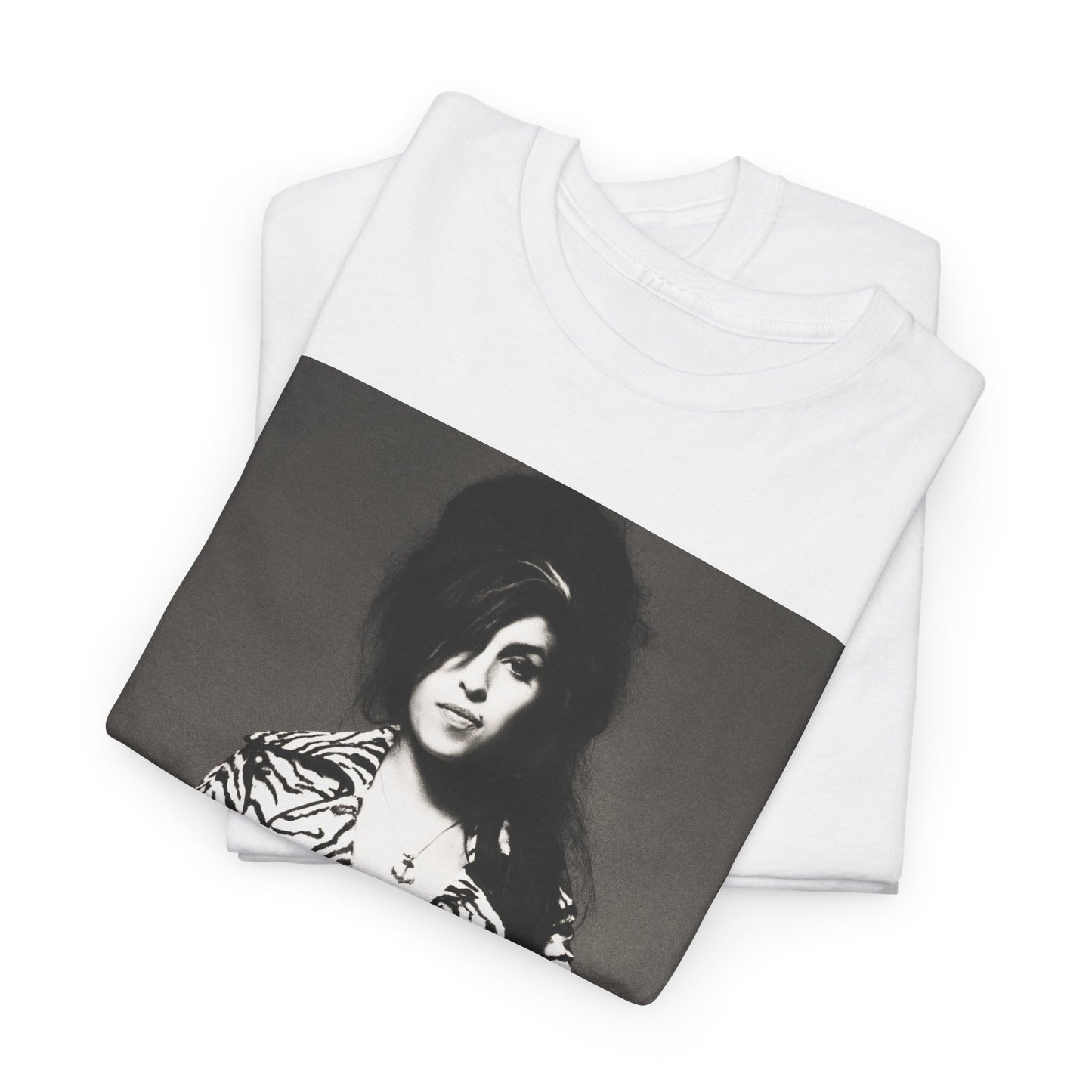 A black graphic t-shirt featuring a vintage black and white portrait of Amy Winehouse, showing her with her signature beehive and soulful expression.