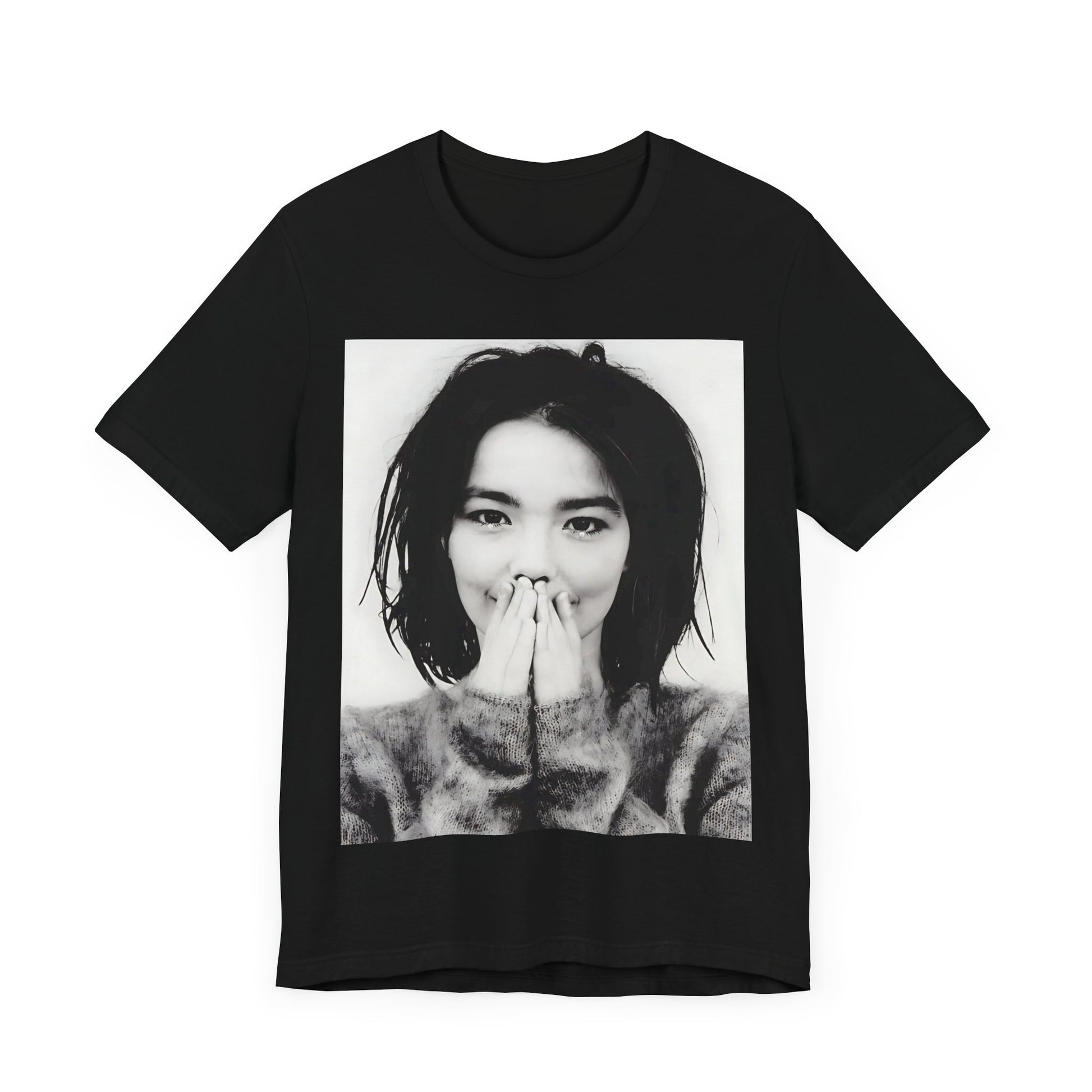 A black graphic t-shirt featuring a 90s black and white photographic portrait of Bjork.