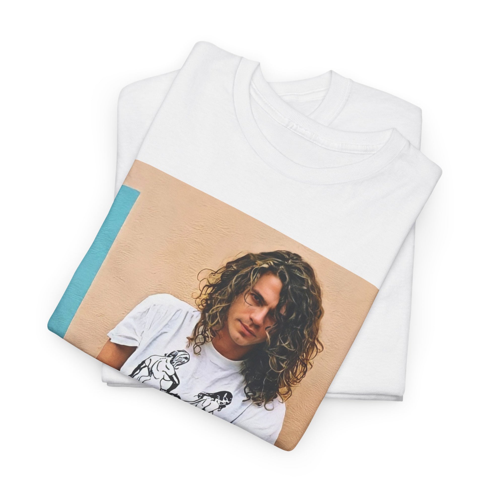 A black graphic t-shirt featuring a 90s chill retro rock graphic of INXS.
