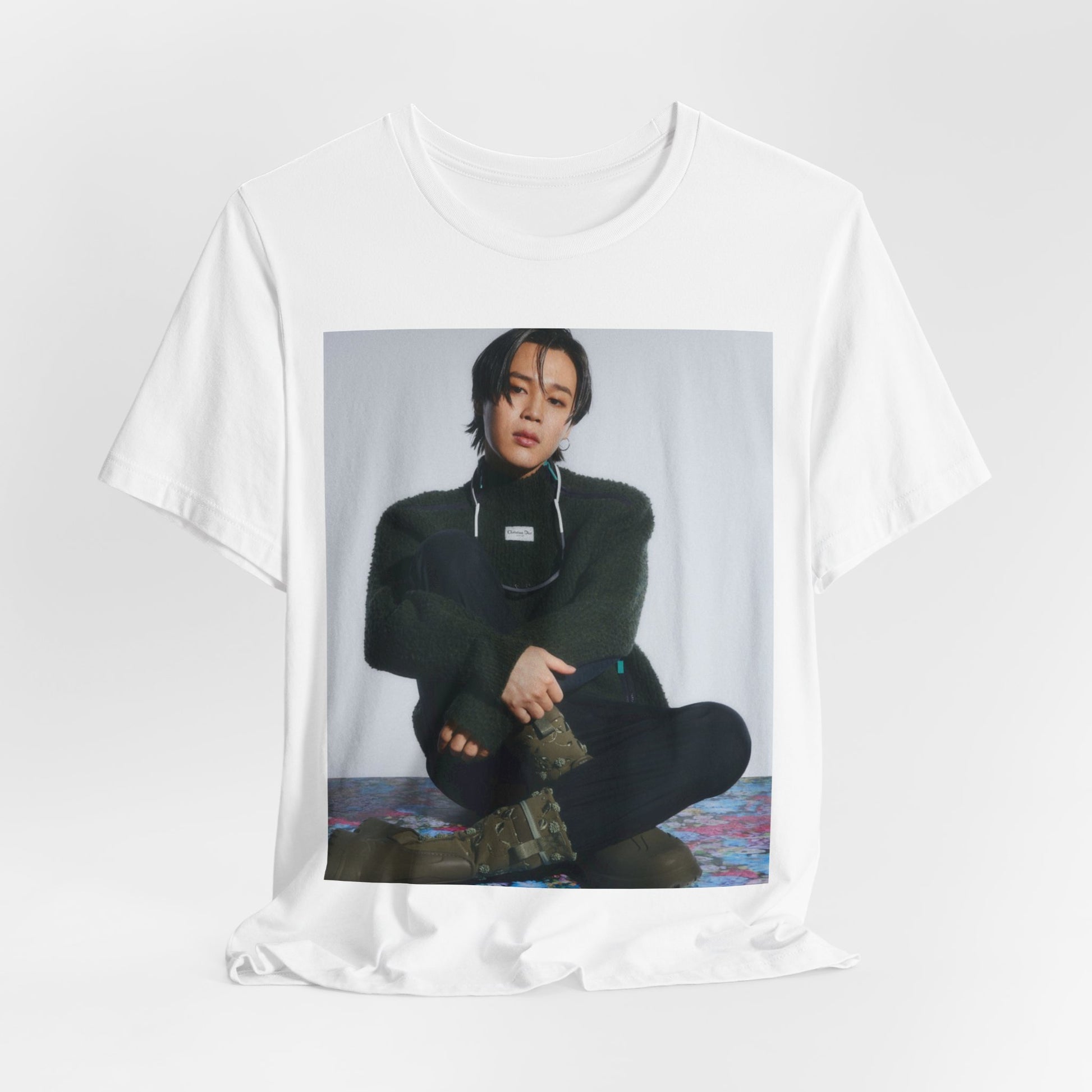 A black graphic t-shirt featuring a modern K-Pop essential graphic of Jimin.
