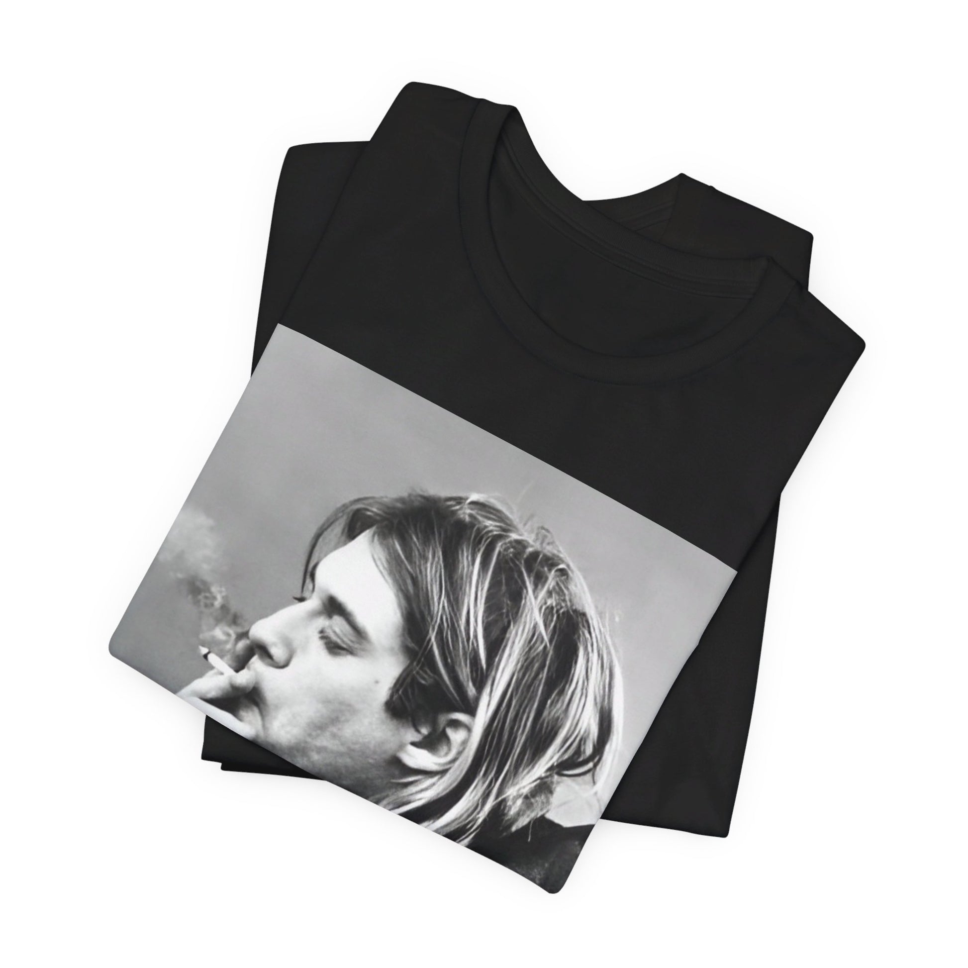 A black graphic t-shirt featuring a vintage photo of a Nirvana member with a cigarette.