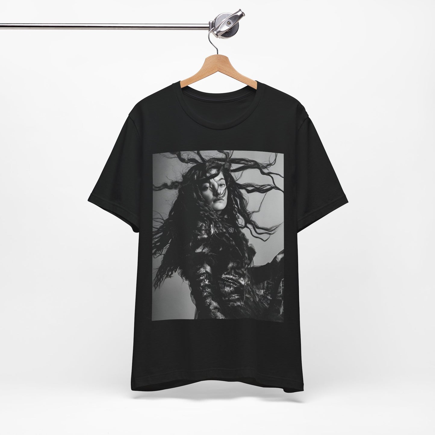 A black graphic t-shirt featuring a black and white retro photo or graphic of Lorde.