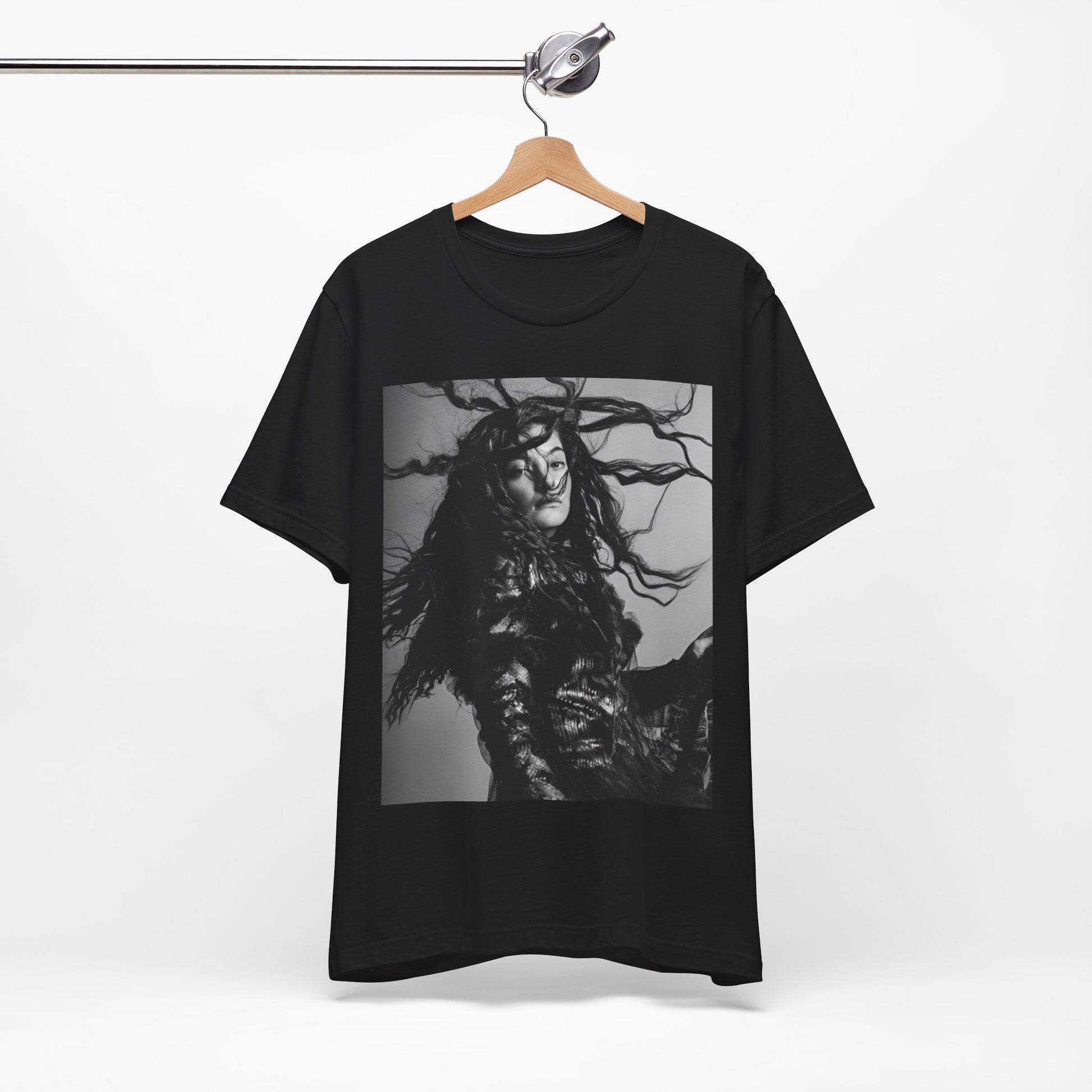 A black graphic t-shirt featuring a black and white retro photo or graphic of Lorde.