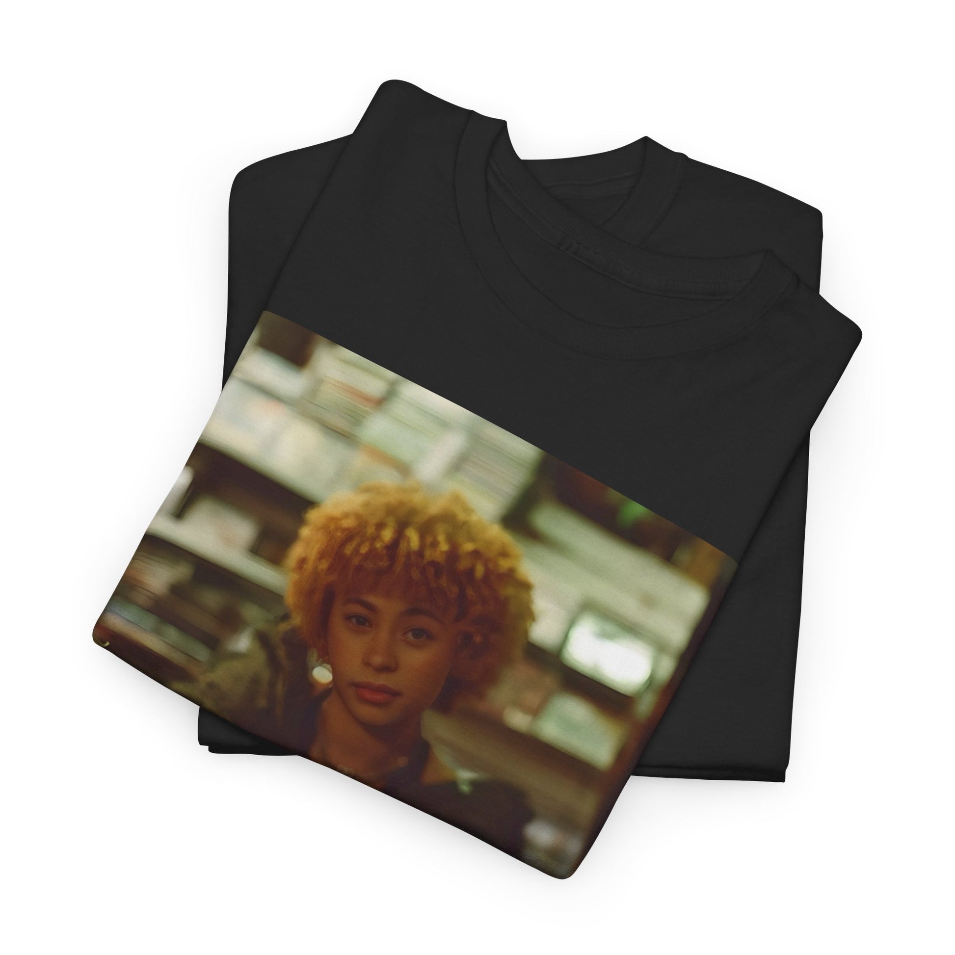 A black graphic t-shirt featuring a stylized graphic of Ice Spice as a TikTok Queen or global sensation.