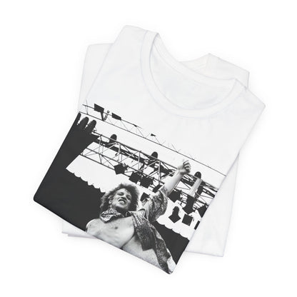 A black graphic t-shirt featuring an epic arena rock graphic of Bon Jovi performing on a large stage.